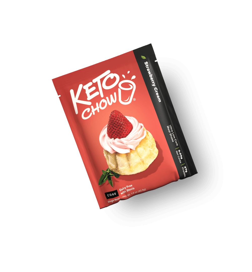 KETO CHOW Strawberry Cream meal shake packet. Red and black foil pouch with KETO CHOW logo, showing a cupcake with strawberry and pink frosting. Text: Ultra Low-carb, 27g Protein, Dairy Free.