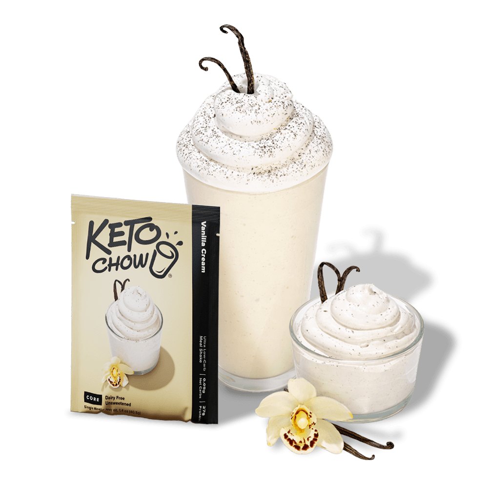 KETO CHOW Vanilla Cream meal shake packet, cream and black. A vanilla shake and whipped cream are garnished with vanilla beans and a yellow orchid.