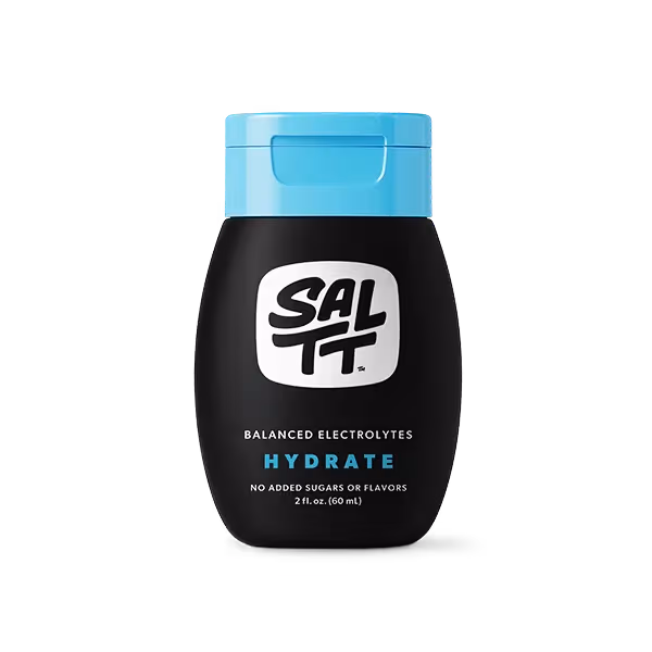 Black SALTT Hydrate electrolyte bottle with blue cap. Visible text: Balanced Electrolytes, No Added Sugars or Flavors, 2 fl. oz. (60 mL).